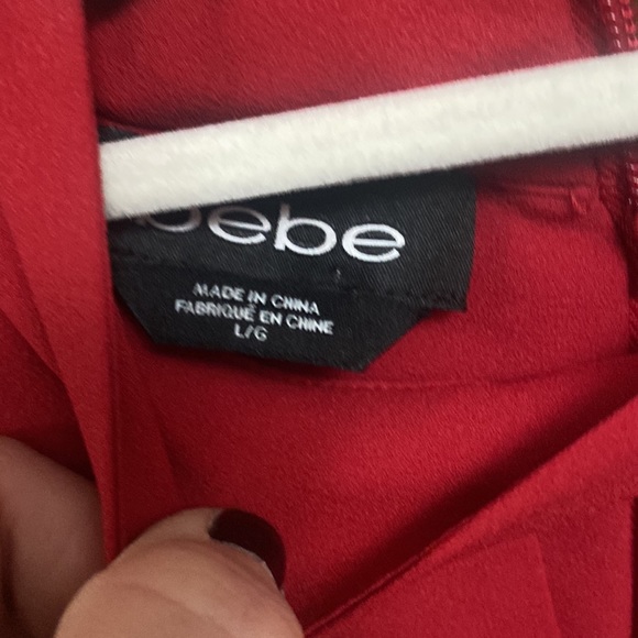 Cranberry color blouse with front keyhole and zip up back. - Picture 4 of 5